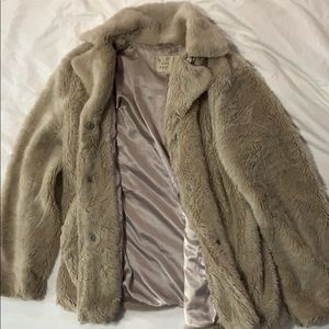 Beige fur coat with satin lining
